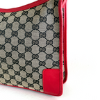 Gucci GG Canvas Shoulder Bag in beige with red leather details