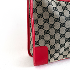 Gucci GG Canvas Shoulder Bag in beige with red leather details