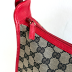 Gucci GG Canvas Shoulder Bag in beige with red leather details